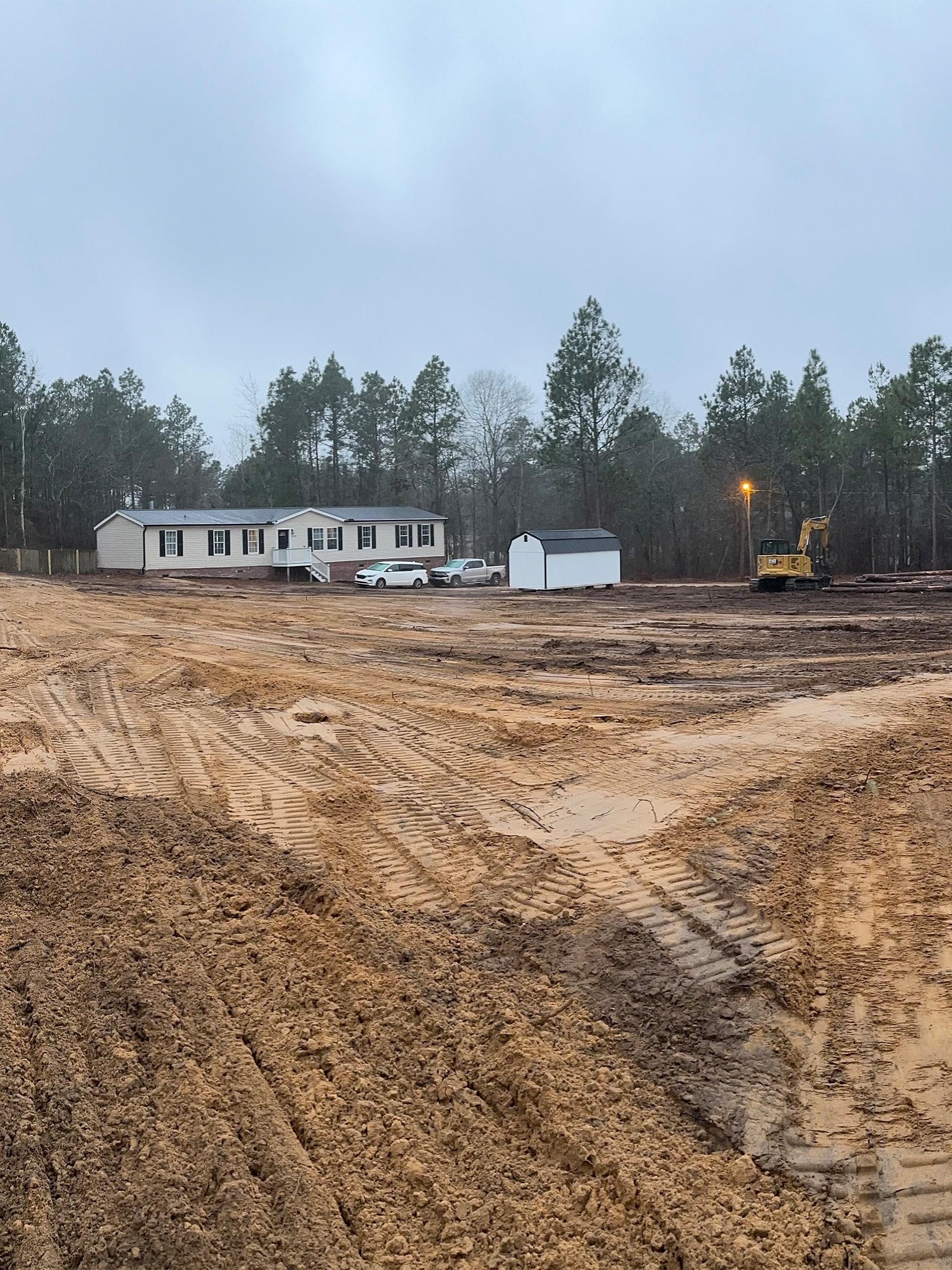 Construction site with a house and equipment